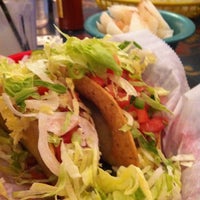 Photo taken at Taqueria el Poblano by Colleen L. on 3/29/2012