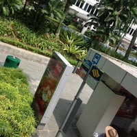 Photo taken at Bus Stop 13019 (Singapore Botanic Gardens) by Julie E. on 11/29/2012