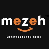Photo taken at Mezeh Mediterranean Grill by Mezeh Mediterranean Grill on 7/29/2013
