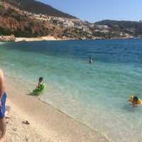 Photo taken at Kalkan Beach by Şahin U. on 9/5/2016