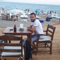 Photo taken at İnan Beach by Mithat ö. on 8/22/2018