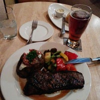 Foto diambil di The Keg Steakhouse + Bar - Banff Caribou oleh Volodymyr C. pada 11/1/2014