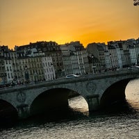 Photo taken at Pont Saint-Michel by Miazga E. on 8/24/2023