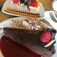 Foto diambil di Pastiche Fine Desserts &amp;amp; Café oleh Petch P. pada 6/23/2019
