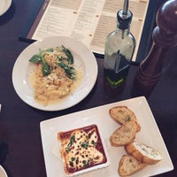 Photo taken at Travinia Italian Kitchen and Wine Bar by Iryna M. on 8/3/2015