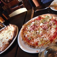 Photo taken at Olio Pizzeria by Tomoka I. on 8/9/2015