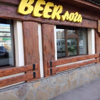 Photo taken at BEERлога by Ludmila B. on 9/18/2014