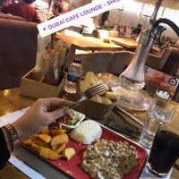 Photo taken at Dubai Cafe Lounge Shisha by queen on 11/19/2019