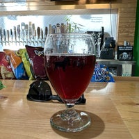 Photo taken at Pop the Top Craft Beer Shop by Joe E. on 10/20/2022