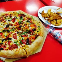 Photo taken at Domino&amp;#39;s Pizza by Mehmet Akif on 2/20/2015