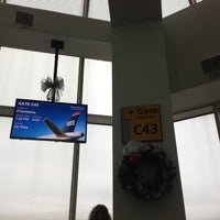 Photo taken at Gate C43 by Tyler M. on 12/26/2012