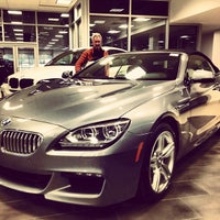 Photo taken at Ray Catena of Westchester, LLC BMW of Westchester by Adrian W. on 2/1/2014
