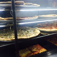 Photo taken at Justino&amp;#39;s Pizzeria by Wanyi L. on 3/14/2015