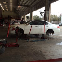Photo taken at Discount Tire by April Y. on 2/21/2015