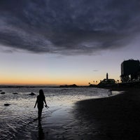 Photo taken at Praia da Barra by Flavio C. on 1/13/2022