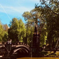 Photo taken at Озеро в Лопатинском саду (с мостом) by Анастасия on 5/12/2018