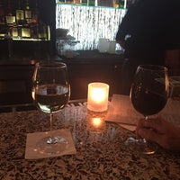 Photo taken at Harvest Seasonal Grill &amp;amp; Wine Bar by tanya r. on 1/10/2015