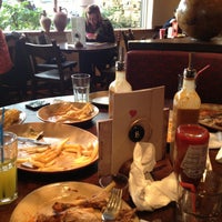 Photo taken at Nando&amp;#39;s by Xel D. on 1/13/2013