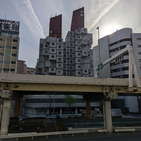 Photo taken at Nakagin Capsule Tower by Leo on 4/11/2022