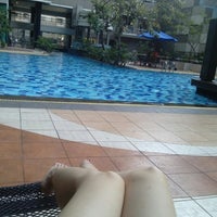 Photo taken at Swimming Pool at Sudirman Park tower B by Athina I. on 9/30/2013