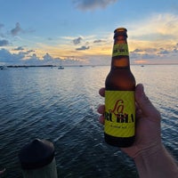 Photo taken at Bayside Sunset Bar, Key Largo by Eric H. on 7/16/2021
