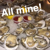 Photo taken at Coast Seafood &amp;amp; Raw Bar by Laura D. on 2/19/2015