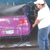 Photo taken at is car wash by Mauricio G. on 9/7/2013