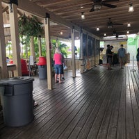 Photo taken at Key Largo Fisheries Backyard Cafe by Chuck D. on 2/22/2021