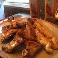Photo taken at Nando&amp;#39;s by George S. on 8/3/2015