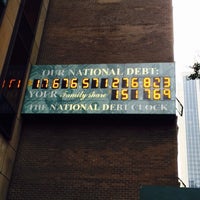 Photo taken at National Debt Clock by Mohammed A. on 9/21/2014