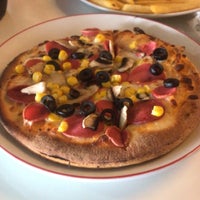 Photo taken at Pasaport Pizza by Emre D. on 4/15/2018