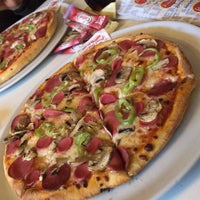 Photo taken at Pasaport Pizza by Emre D. on 3/28/2019