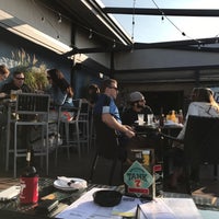 Photo taken at The Garage Bar &amp;amp; Sandwiches by Bruce L. on 9/1/2017