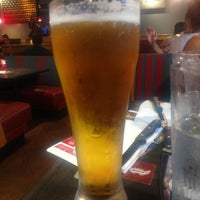 Photo taken at Red Robin Gourmet Burgers and Brews by C on 8/18/2018