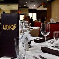 Photo taken at Lithos Estiatorio Restaurant by Alban V. on 1/2/2020