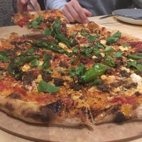 Photo taken at SouthPaw wood fired pizza by Cem H. on 1/11/2017