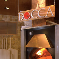 Photo taken at Bocca Coal Fired Bistro by Bocca Coal Fired Bistro on 9/22/2013