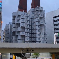 Photo taken at Nakagin Capsule Tower by ぽる on 4/17/2022