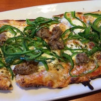 Photo taken at California Pizza Kitchen by Christian L. on 10/31/2013