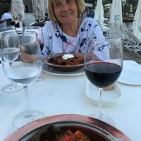 Photo taken at Divan Palmira Restaurant by Şevket Y. on 6/8/2018