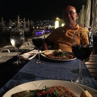 Photo taken at Divan Palmira Restaurant by Şevket Y. on 9/18/2017