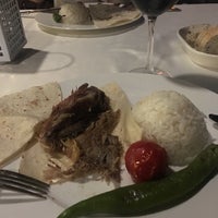 Photo taken at Divan Palmira Restaurant by Şevket Y. on 6/2/2018