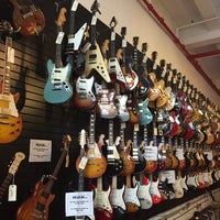 Photo taken at 30th Street Guitars by Sinem S. on 9/19/2015