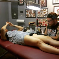 Photo taken at Animal Farm Tattoo by Rory J. on 7/24/2015