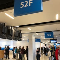 Photo taken at Gate 52F by Aya Z. on 2/25/2018
