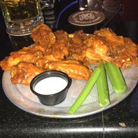 Photo taken at Pluckers Wing Bar by Claudio P. on 3/22/2018