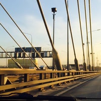 Photo taken at Bolshoy Obukhovsky Bridge (Cable-stayed bridge) by Верни Деньги -. on 4/30/2015