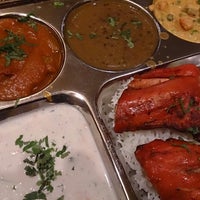 Photo taken at New India&amp;#39;s Oven: Exotic Cuisine of India by Tac S. on 12/29/2013