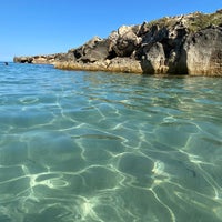 Photo taken at Spiaggia di Calamosche by Eleonora A. on 7/25/2021