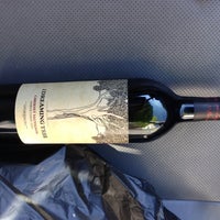 Photo taken at Petzinger&amp;#39;s Wine &amp;amp; Liquors by Bryan H. on 10/11/2012